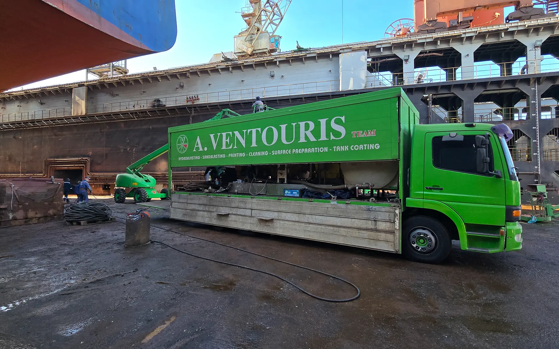 Maintenance and painting on the ship Contship Box 11