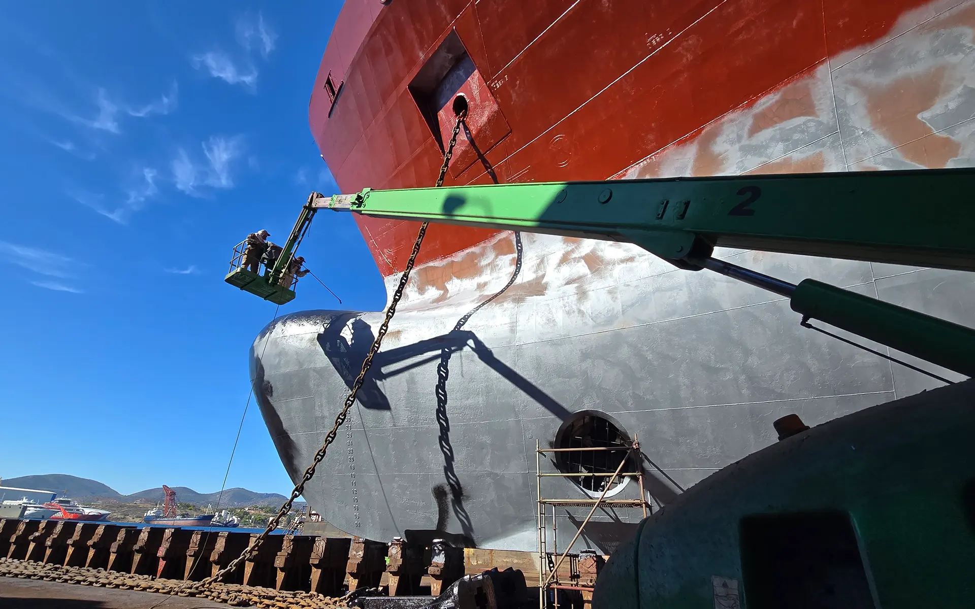 Maintenance and painting on the ship Contship Box 9